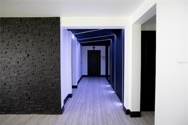 13851 Rushing Creek Run, Orlando, FL 32824 - corridor with wood finished floors and baseboards