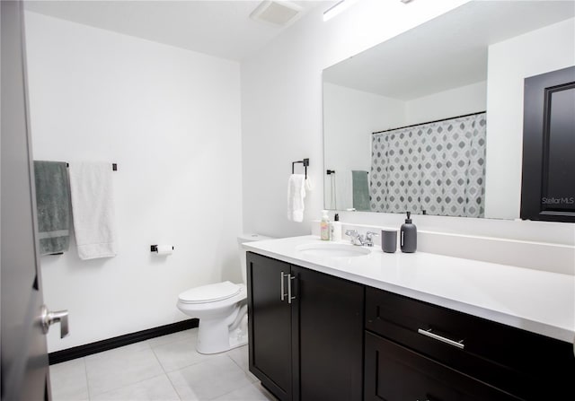 13851 Rushing Creek Run, Orlando, FL 32824 - full bathroom with tile patterned floors, toilet, vanity, and a shower with shower curtain