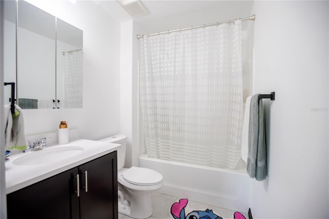 13851 Rushing Creek Run, Orlando, FL 32824 - bathroom with toilet, vanity, shower / bath combo, and tile patterned flooring