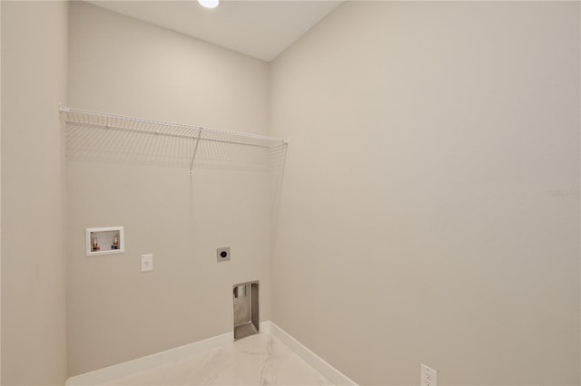 934 Jessamy St, Oviedo, FL 32765 - washroom featuring electric dryer hookup, washer hookup, light marble finish floors, and baseboards