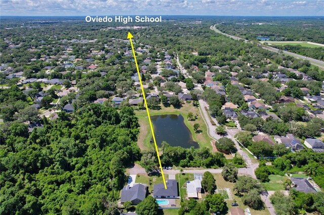 934 Jessamy St, Oviedo, FL 32765 - aerial view of residential area featuring a nearby body of water and property parcel outlined