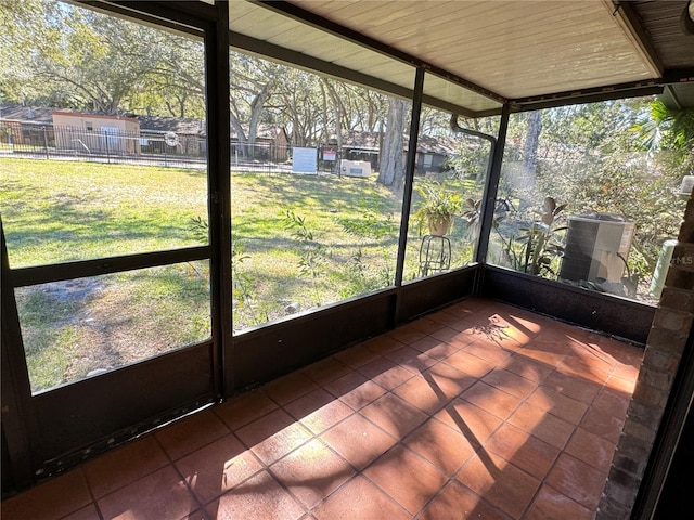 1825 Foxhall Cir Unit 1825, Kissimmee, FL 34741 - unfurnished sunroom featuring healthy amount of natural light