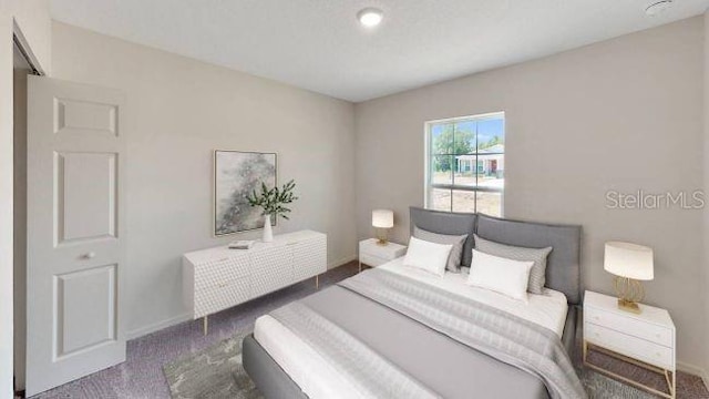 1114 Camden Way W, Poinciana, FL 34758 - bedroom featuring carpet and baseboards