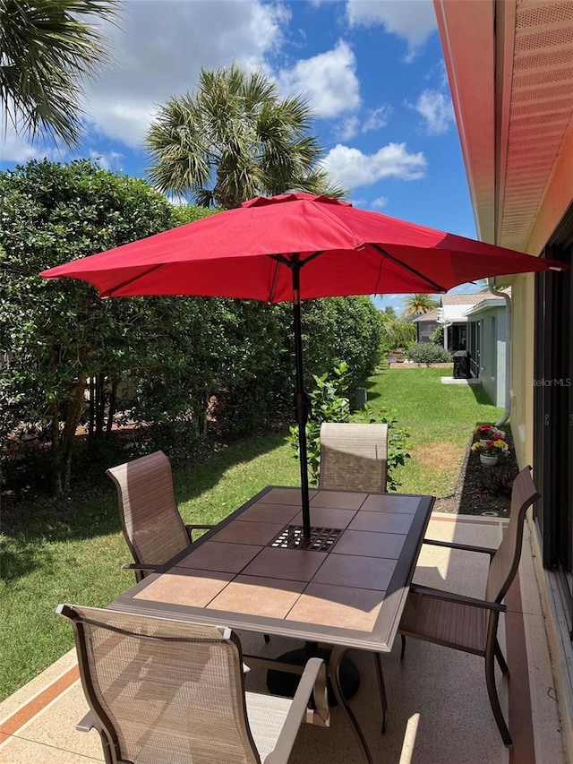 1121 Alcove Loop, The Villages, FL 32162 - view of patio / terrace with outdoor dining space