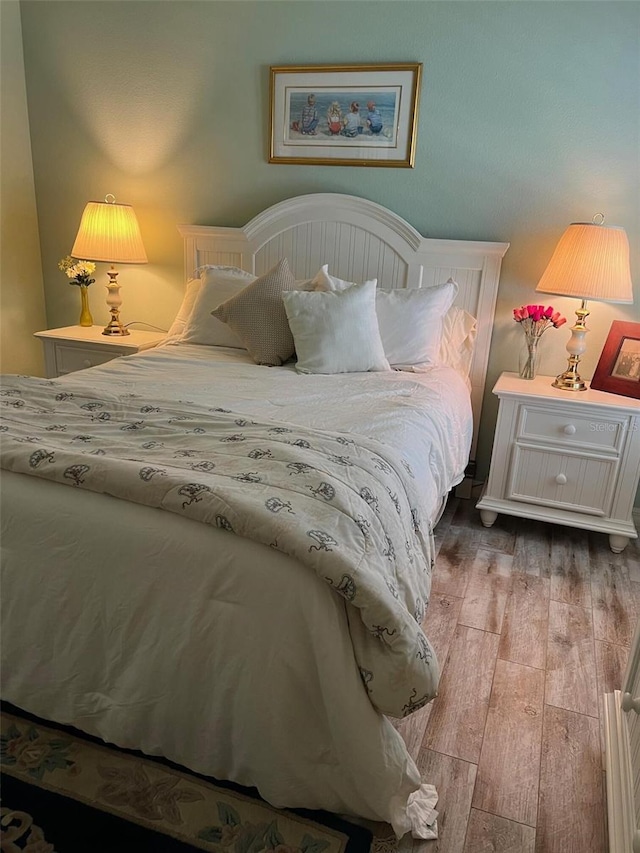 1121 Alcove Loop, The Villages, FL 32162 - bedroom with wood finished floors