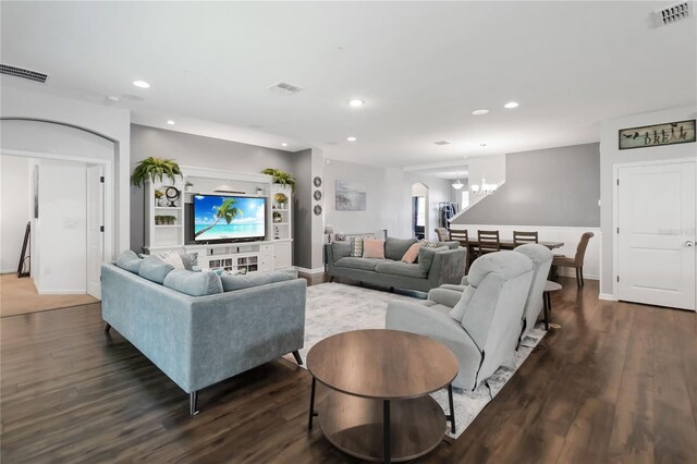 1265 Blarney St, Minneola, FL 34715 - living area featuring recessed lighting, dark wood-type flooring, a chandelier, and baseboards