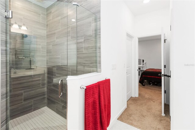 1265 Blarney St, Minneola, FL 34715 - bathroom featuring a stall shower and baseboards