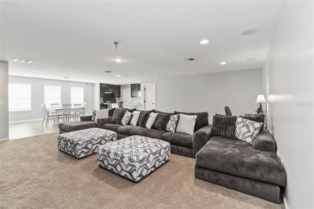1265 Blarney St, Minneola, FL 34715 - living area with recessed lighting, carpet, and baseboards