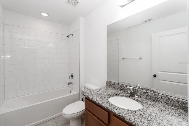 1265 Blarney St, Minneola, FL 34715 - full bathroom featuring toilet, vanity, shower / bathtub combination, and tile patterned flooring