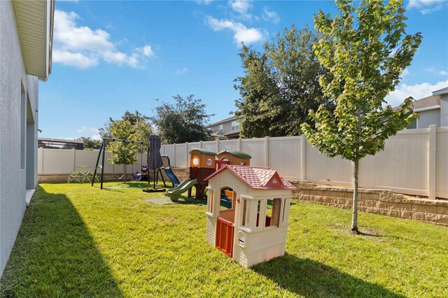 1265 Blarney St, Minneola, FL 34715 - view of yard featuring a playground