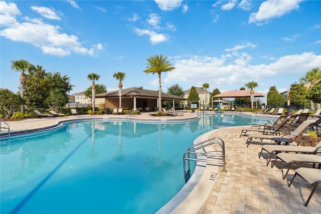 1265 Blarney St, Minneola, FL 34715 - community pool with a patio area