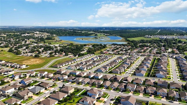 1265 Blarney St, Minneola, FL 34715 - aerial view of property and surrounding area with a nearby body of water and nearby suburban area