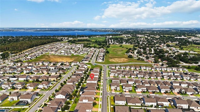 1265 Blarney St, Minneola, FL 34715 - aerial view of property's location featuring a nearby body of water and nearby suburban area