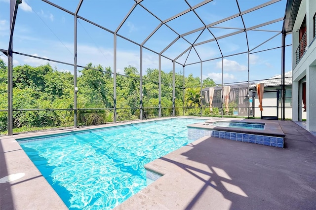 3844 Bowfin Trl, Kissimmee, FL 34746 - view of pool with a lanai, a patio, and a pool with connected hot tub