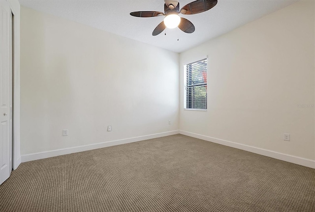 3844 Bowfin Trl, Kissimmee, FL 34746 - spare room with carpet floors, ceiling fan, and baseboards