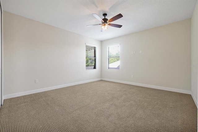3844 Bowfin Trl, Kissimmee, FL 34746 - unfurnished room with carpet flooring, ceiling fan, and baseboards