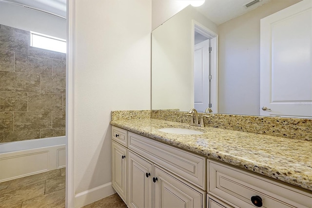 3844 Bowfin Trl, Kissimmee, FL 34746 - bathroom with vanity and shower / washtub combination