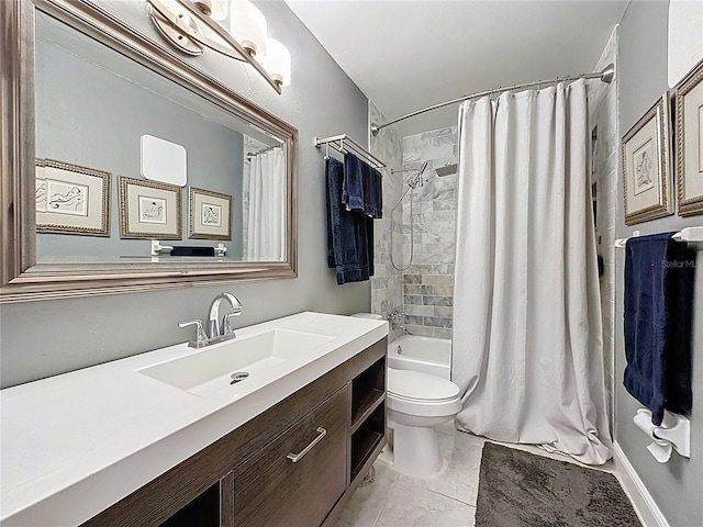 full bath featuring toilet, vanity, and shower / bath combo