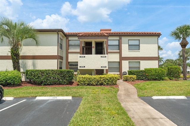 3475 Flossmoor Ave Unit 103, Orlando, FL 32822 - view of property with uncovered parking