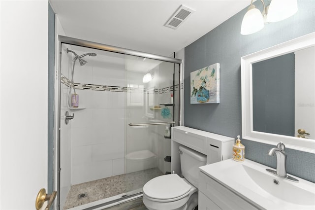 3475 Flossmoor Ave Unit 103, Orlando, FL 32822 - bathroom featuring toilet, a stall shower, and vanity