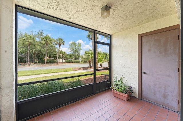 3475 Flossmoor Ave Unit 103, Orlando, FL 32822 - unfurnished sunroom with healthy amount of natural light