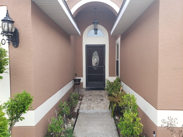 340 Haversham Way, Davenport, FL 33897 - entrance to property featuring stucco siding
