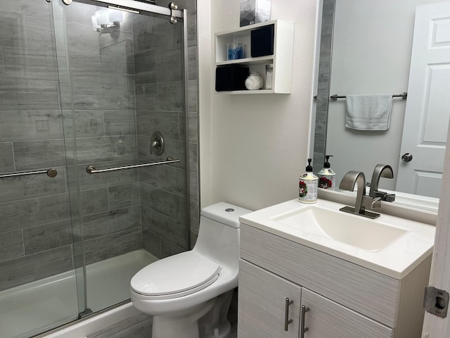 340 Haversham Way, Davenport, FL 33897 - bathroom featuring vanity, a stall shower, and toilet