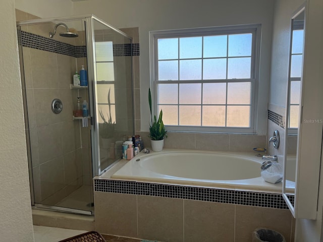 340 Haversham Way, Davenport, FL 33897 - full bath featuring a bath, healthy amount of natural light, and a shower stall