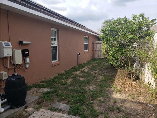 340 Haversham Way, Davenport, FL 33897 - view of side of home with stucco siding