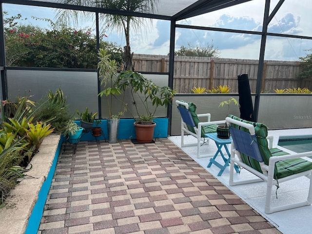 340 Haversham Way, Davenport, FL 33897 - view of patio with glass enclosure