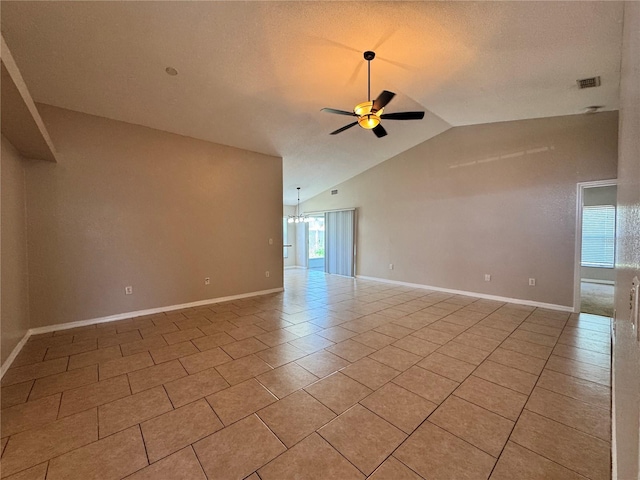 703 Tartan Loop, Lake Wales, FL 33853 - unfurnished room with a ceiling fan, lofted ceiling, light tile patterned floors, and baseboards