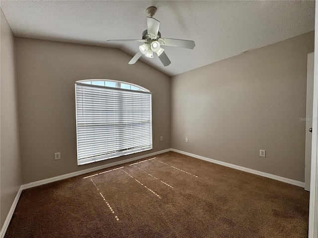 703 Tartan Loop, Lake Wales, FL 33853 - unfurnished room with carpet flooring, a ceiling fan, baseboards, vaulted ceiling, and a textured ceiling