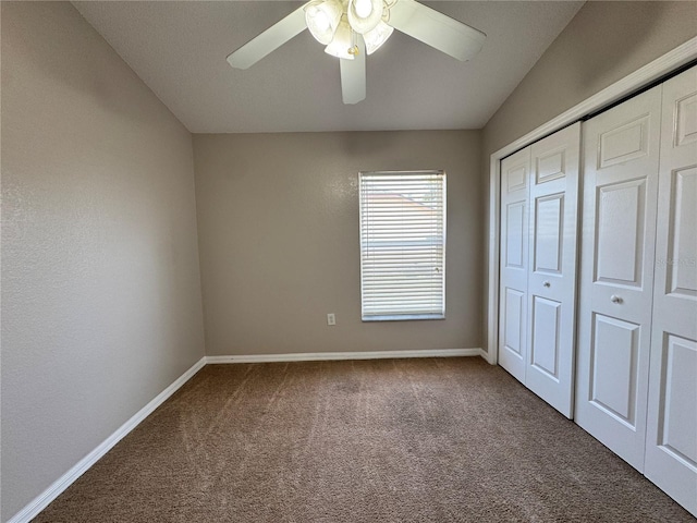 703 Tartan Loop, Lake Wales, FL 33853 - unfurnished bedroom featuring carpet floors, baseboards, a closet, and ceiling fan
