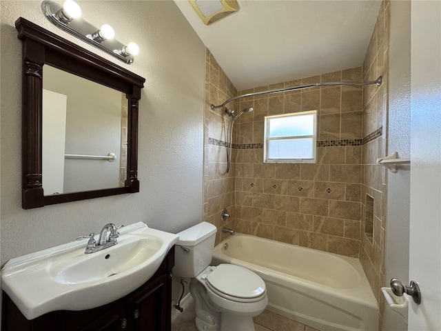 703 Tartan Loop, Lake Wales, FL 33853 - bathroom with toilet, vanity, shower / tub combination, tile patterned flooring, and a textured wall