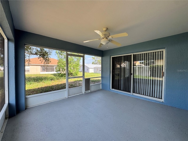 703 Tartan Loop, Lake Wales, FL 33853 - unfurnished sunroom with a ceiling fan