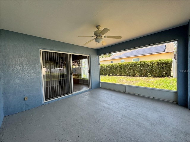 703 Tartan Loop, Lake Wales, FL 33853 - unfurnished sunroom with ceiling fan
