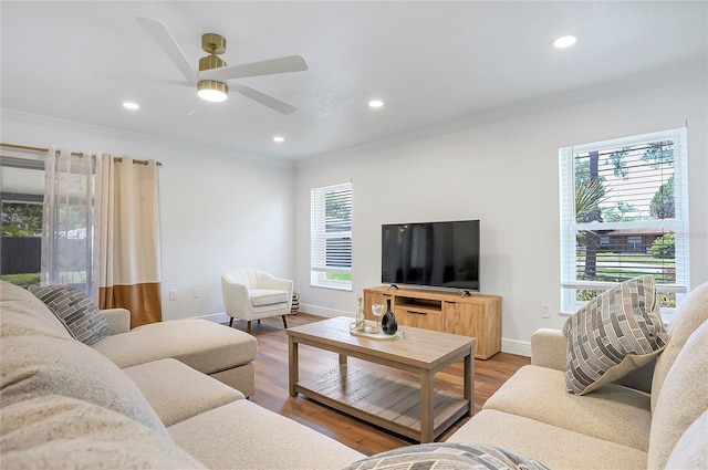 6700 Tamarind Cir, Orlando, FL 32819 - living room with crown molding, a ceiling fan, baseboards, recessed lighting, and wood finished floors