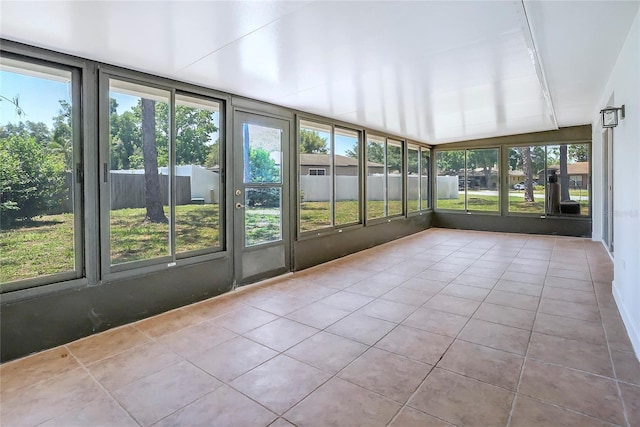 6700 Tamarind Cir, Orlando, FL 32819 - unfurnished sunroom with plenty of natural light and vaulted ceiling