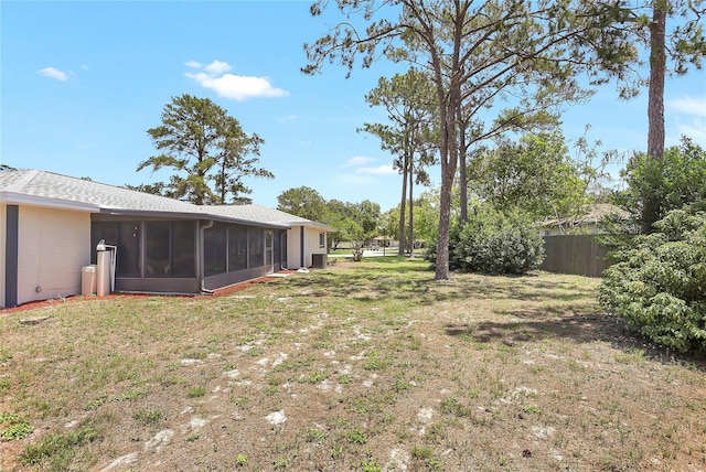 6700 Tamarind Cir, Orlando, FL 32819 - view of yard featuring a sunroom