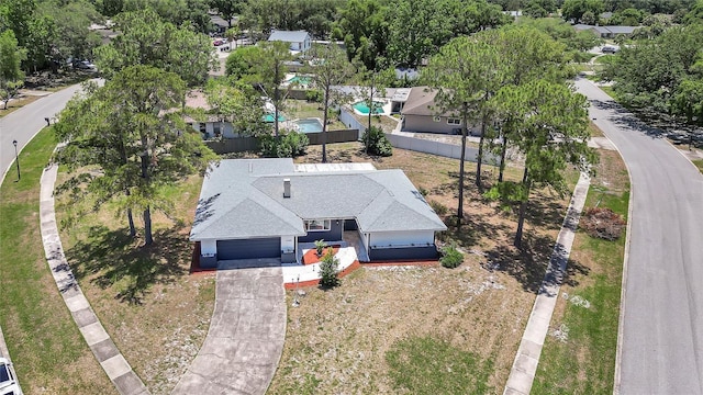 6700 Tamarind Cir, Orlando, FL 32819 - aerial view of property and surrounding area featuring a pool