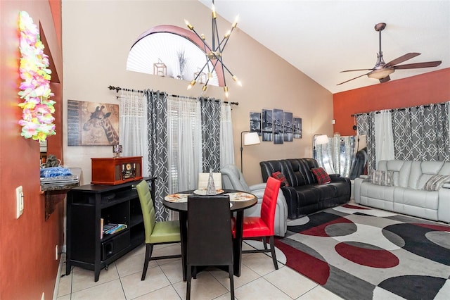 109 Lakepointe Cir, Kissimmee, FL 34743 - tiled dining area with a ceiling fan and high vaulted ceiling