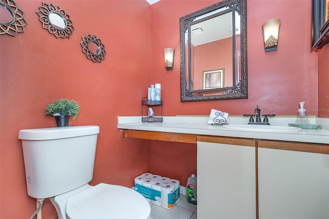 109 Lakepointe Cir, Kissimmee, FL 34743 - half bathroom featuring toilet, vanity, and tile patterned floors