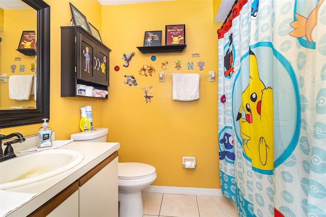 109 Lakepointe Cir, Kissimmee, FL 34743 - full bath with toilet, vanity, tile patterned flooring, baseboards, and a shower with curtain
