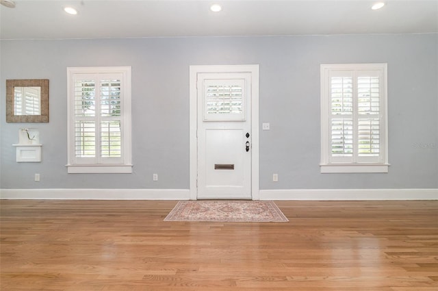 338 E Anderson St, Orlando, FL 32801 - entrance foyer with recessed lighting, baseboards, and light wood finished floors