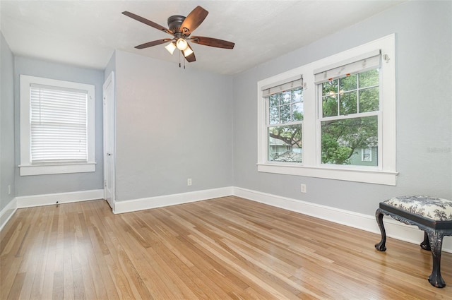 338 E Anderson St, Orlando, FL 32801 - unfurnished room featuring light wood-style floors, baseboards, and ceiling fan