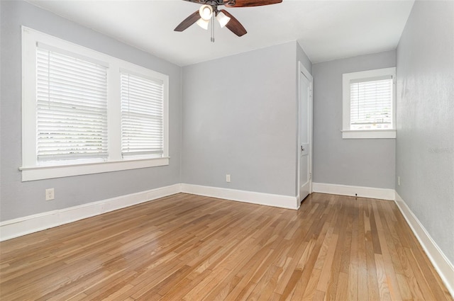 338 E Anderson St, Orlando, FL 32801 - spare room featuring ceiling fan, light wood-type flooring, and baseboards
