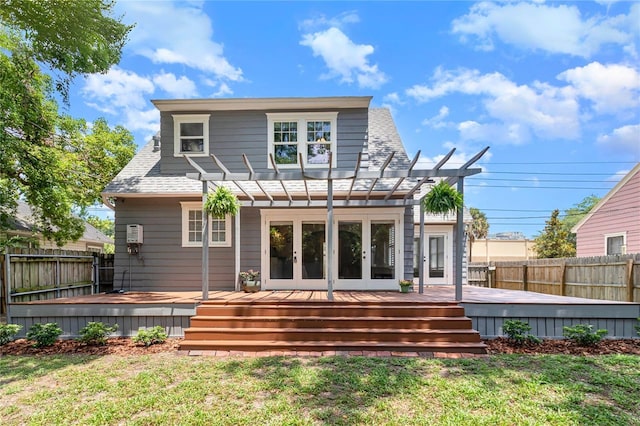 338 E Anderson St, Orlando, FL 32801 - rear view of property with a pergola, french doors, a wooden deck, and a shingled roof