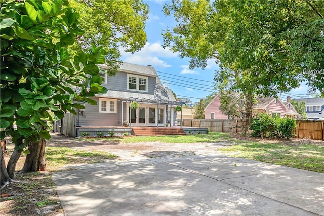 338 E Anderson St, Orlando, FL 32801 - rear view of house with a wooden deck and a patio area