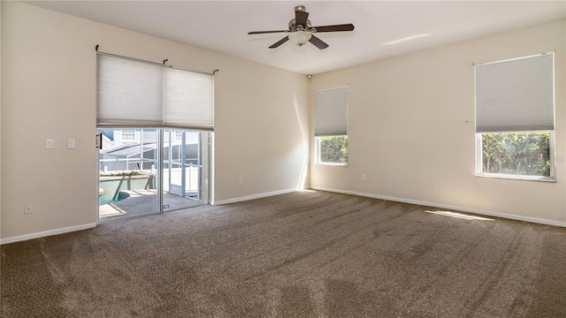 1201 Shelter Rock Rd, Orlando, FL 32835 - spare room featuring a ceiling fan, carpet, and baseboards