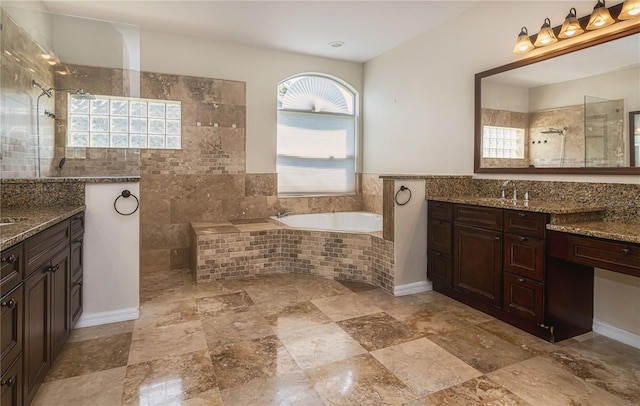 1201 Shelter Rock Rd, Orlando, FL 32835 - bathroom with a walk in shower, vanity, a bath, and stone finish floors